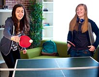 students playing ping pong